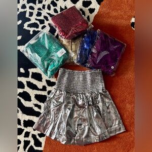 SIX pair of shiny shorts. Brand NEW! In packages. Boutique Clean OUT.